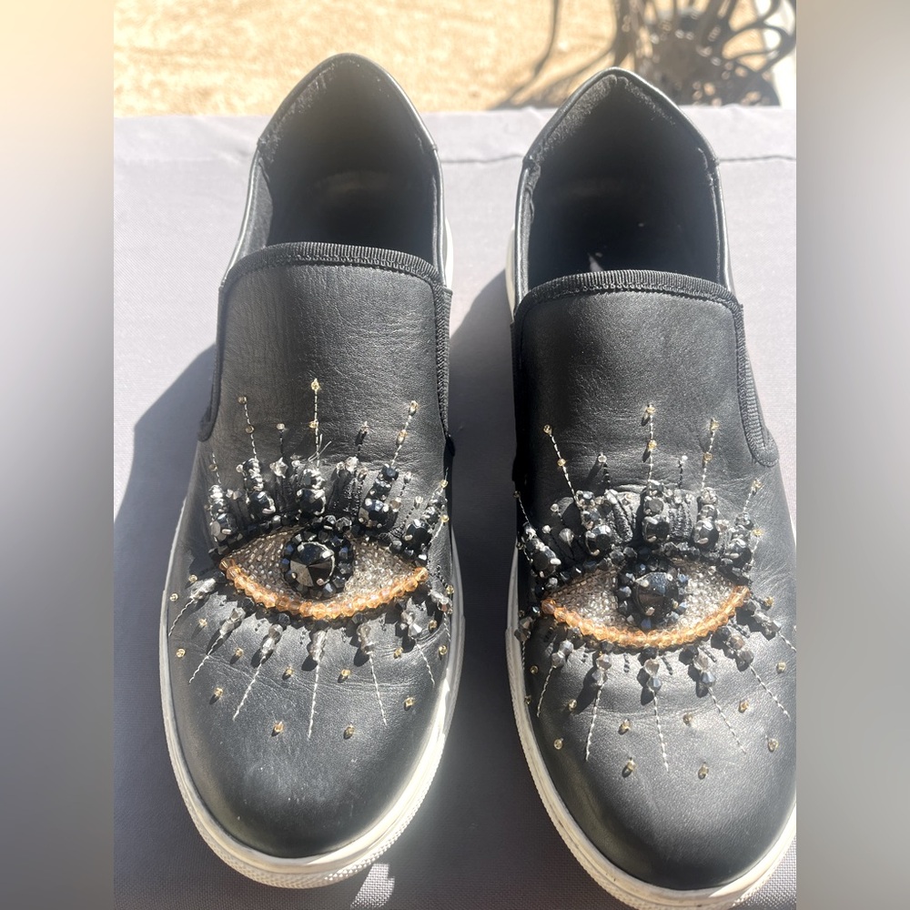 Kurt Geiger Black Slip-On Shoes with Eye Embellishment